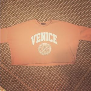 Cropped long sleeve sweater